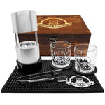 Barware set with two glasses, a lamp, tongs, and a tray on a white background.